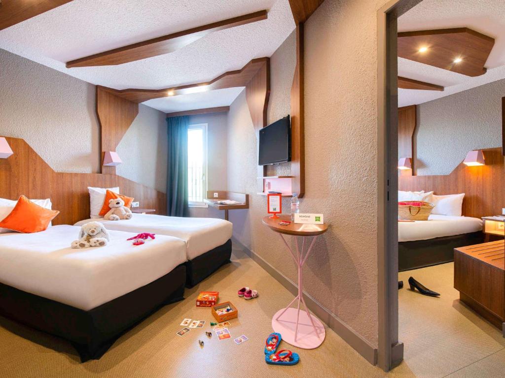 Postel nebo postele na pokoji v ubytování ibis Styles Gien