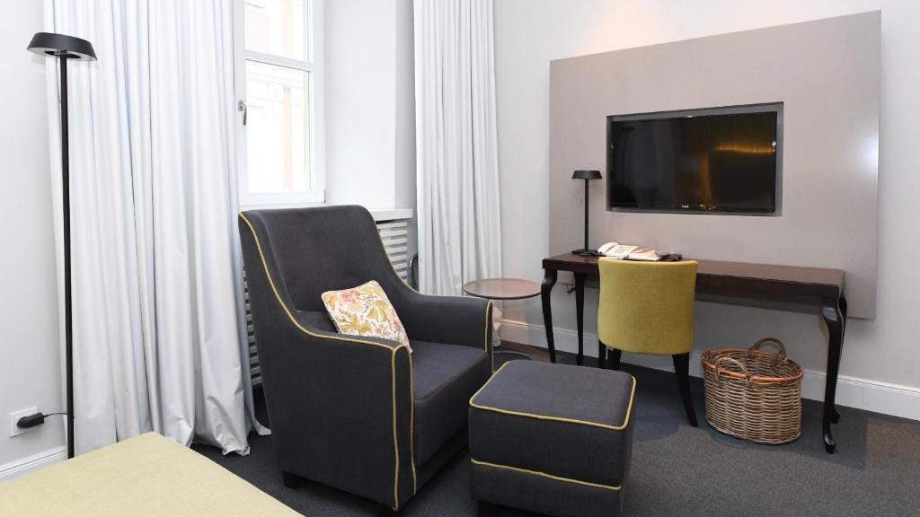 TV a/nebo společenská místnost v ubytování Hotel Bischofshof am Dom
