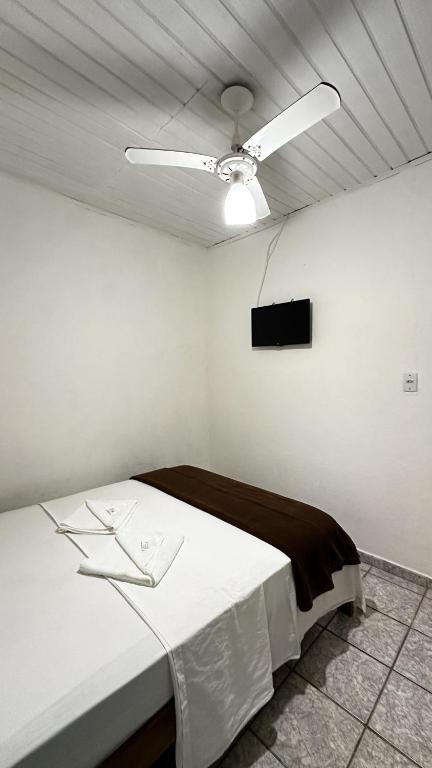 Postel nebo postele na pokoji v ubytování Pousada Manjericão