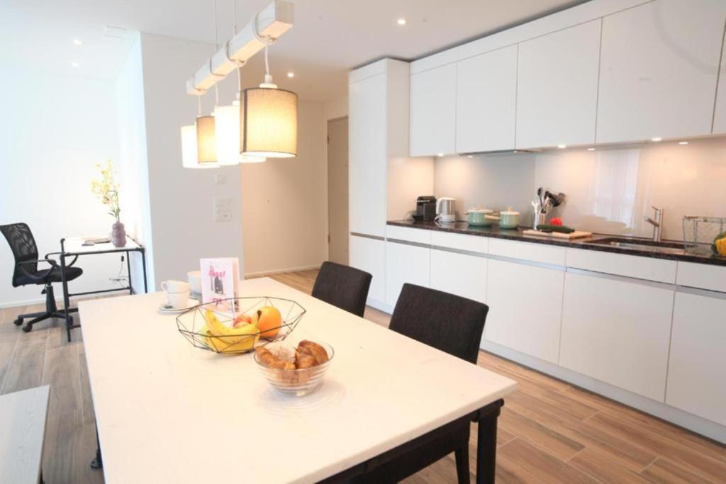 Kuchyň nebo kuchyňský kout v ubytování The City Zug Apartments
