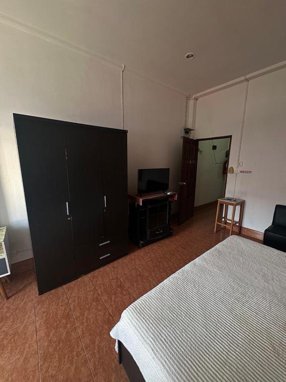 Postel nebo postele na pokoji v ubytování Lucky Banzaan