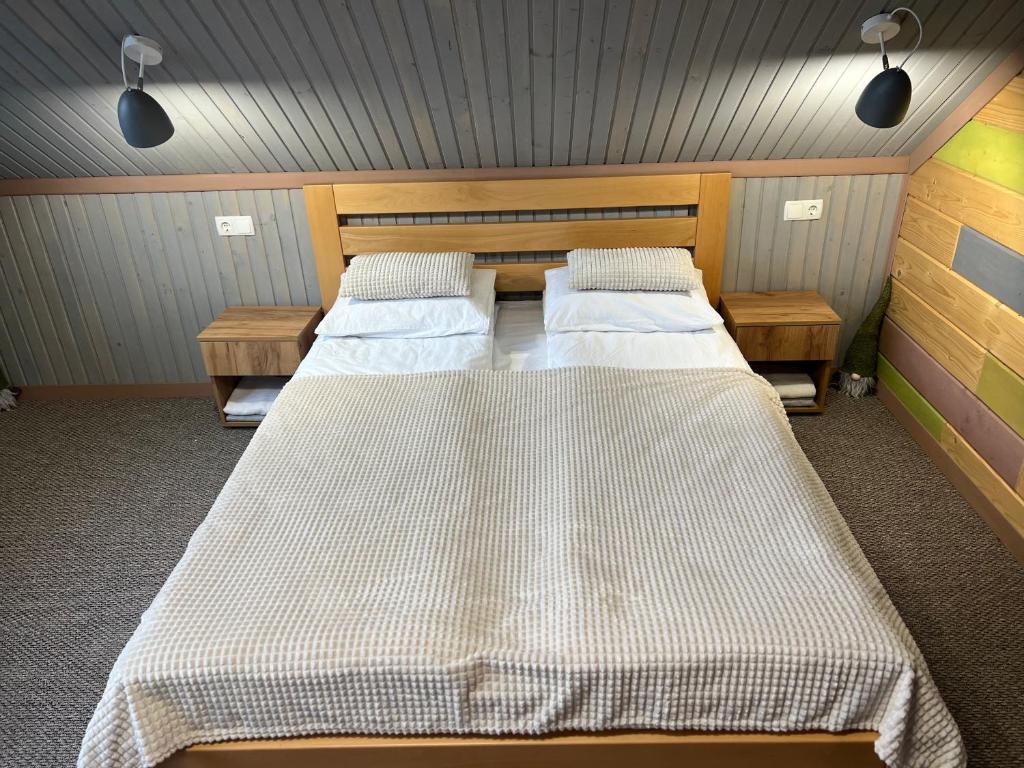 Postel nebo postele na pokoji v ubytování Sonna