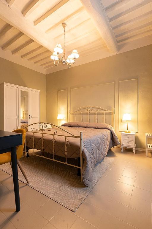 Postel nebo postele na pokoji v ubytování Antica dimora