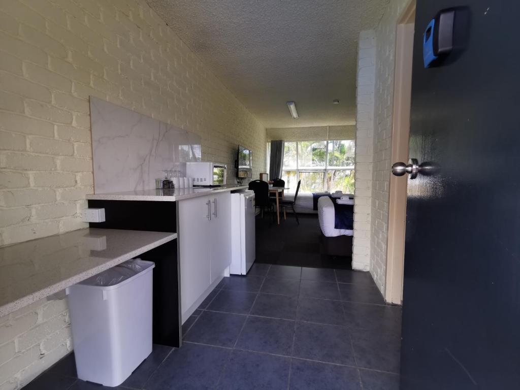 Kuchyň nebo kuchyňský kout v ubytování Aquajet Motel