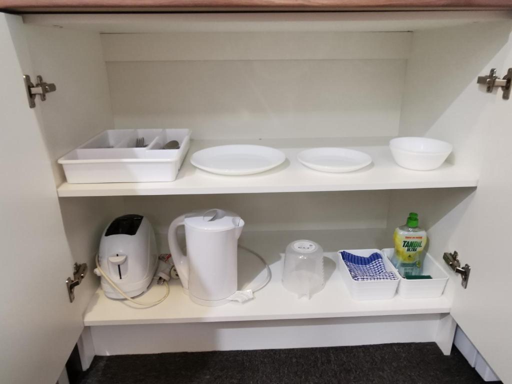 Kuchyň nebo kuchyňský kout v ubytování Aquajet Motel