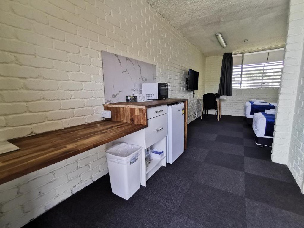 Kuchyň nebo kuchyňský kout v ubytování Aquajet Motel