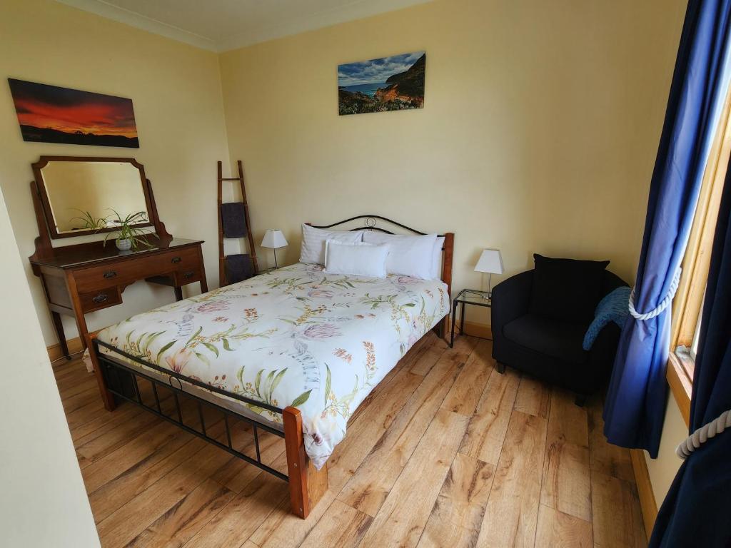 Postel nebo postele na pokoji v ubytování Ruby's Cottage Farm Stay