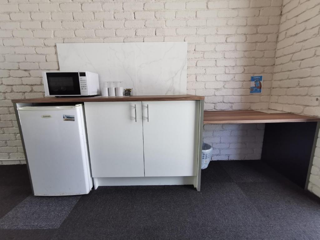 Kuchyň nebo kuchyňský kout v ubytování Aquajet Motel
