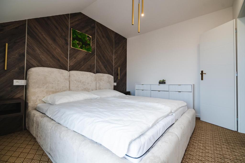 Postel nebo postele na pokoji v ubytování OLI Apartmán