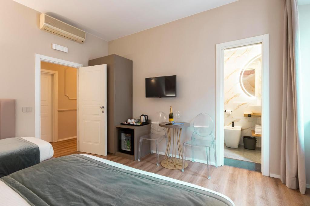 Postel nebo postele na pokoji v ubytování Hotel Magic