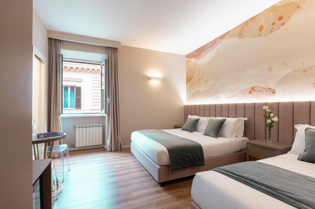 Postel nebo postele na pokoji v ubytování Hotel Magic
