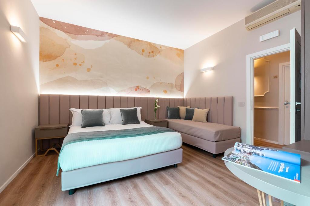 Postel nebo postele na pokoji v ubytování Hotel Magic