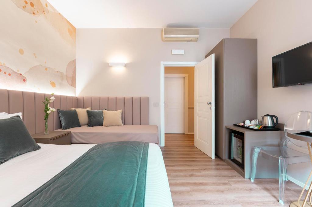 Postel nebo postele na pokoji v ubytování Hotel Magic
