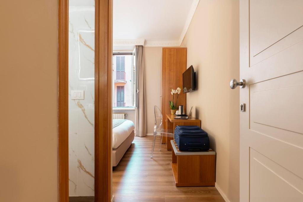 Postel nebo postele na pokoji v ubytování Hotel Magic