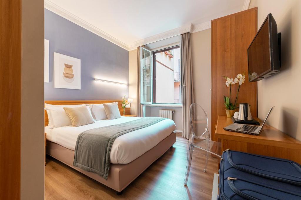 Postel nebo postele na pokoji v ubytování Hotel Magic