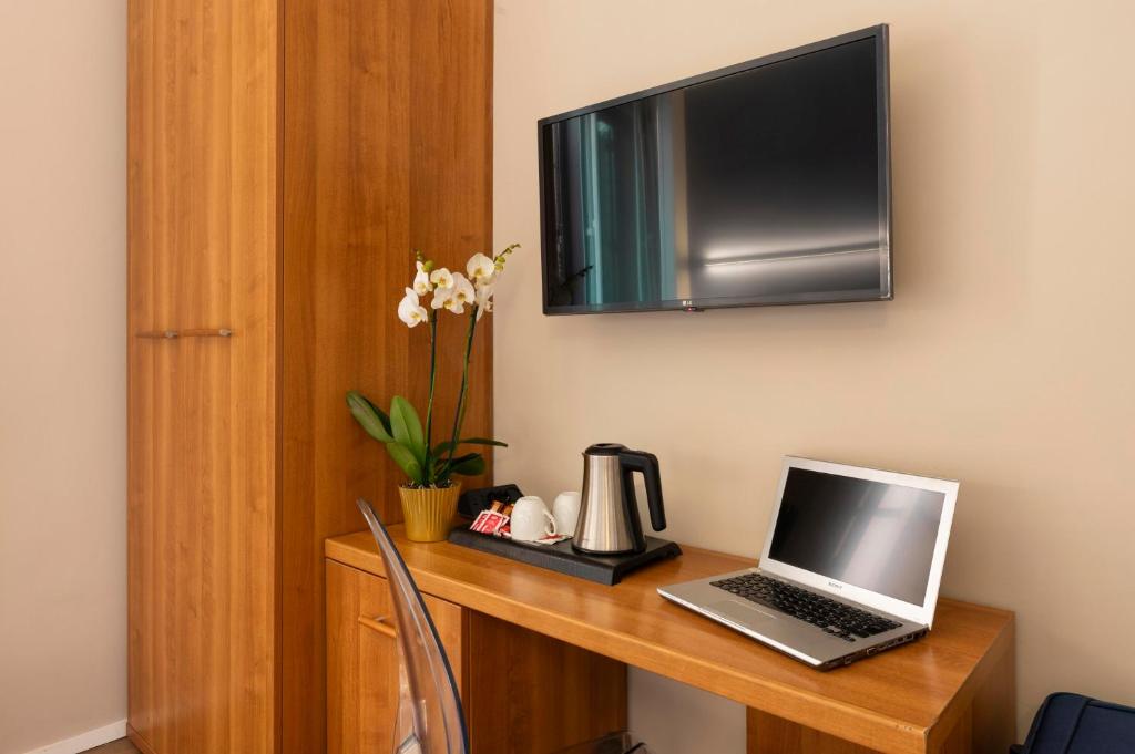 TV a/nebo společenská místnost v ubytování Hotel Magic