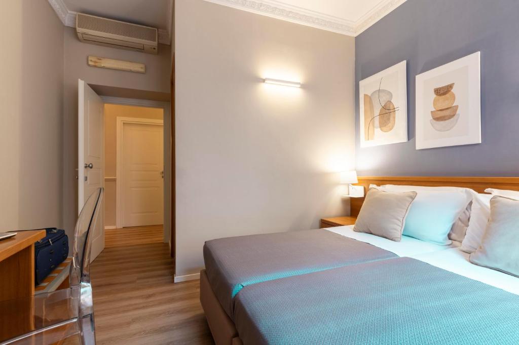 Postel nebo postele na pokoji v ubytování Hotel Magic