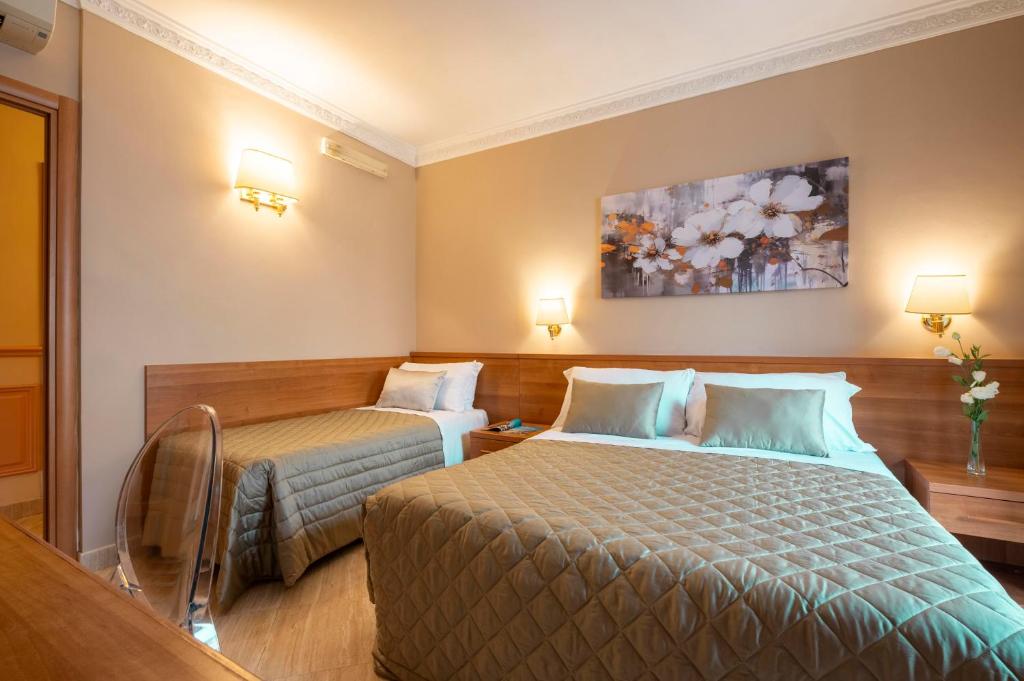 Postel nebo postele na pokoji v ubytování Hotel Magic