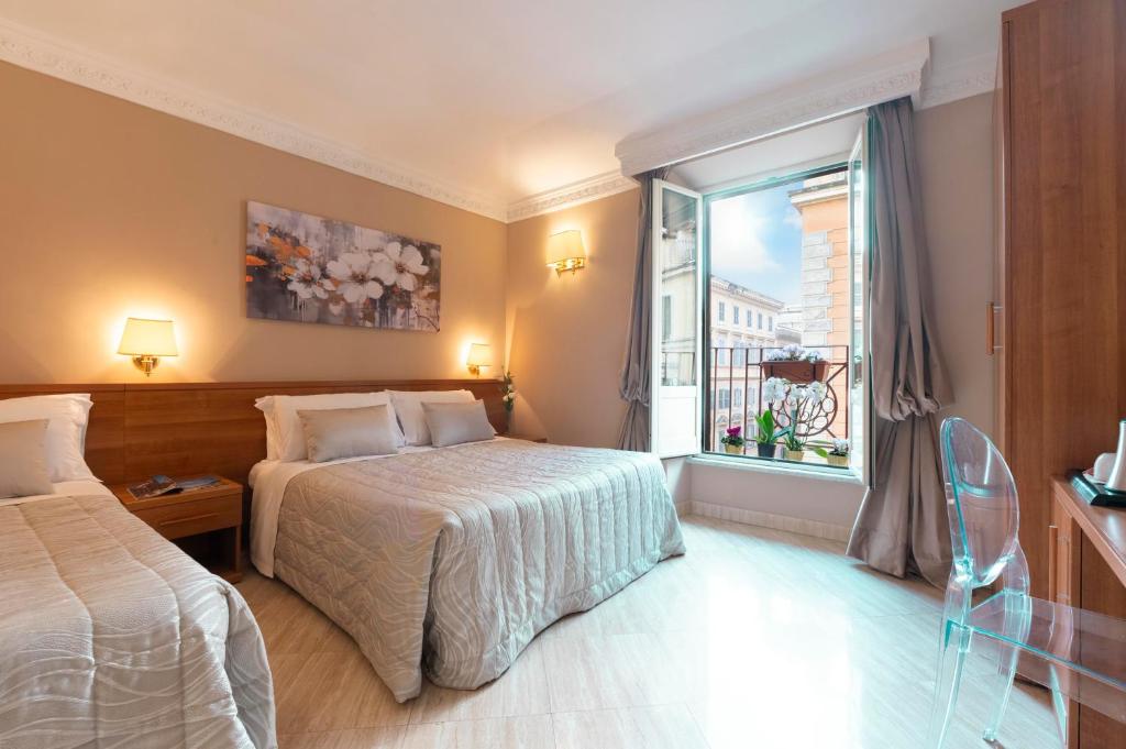 Postel nebo postele na pokoji v ubytování Hotel Magic