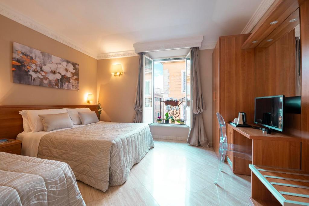 Postel nebo postele na pokoji v ubytování Hotel Magic