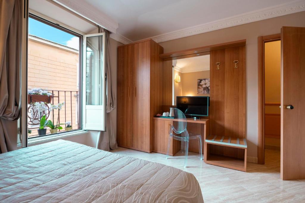 Postel nebo postele na pokoji v ubytování Hotel Magic