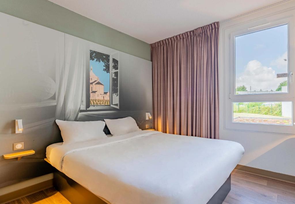 Postel nebo postele na pokoji v ubytování B&B HOTEL Béthune Bruay-la-Buissière