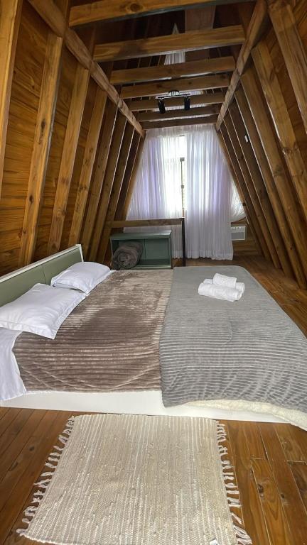 Postel nebo postele na pokoji v ubytování Pousada Portal Dos Campos
