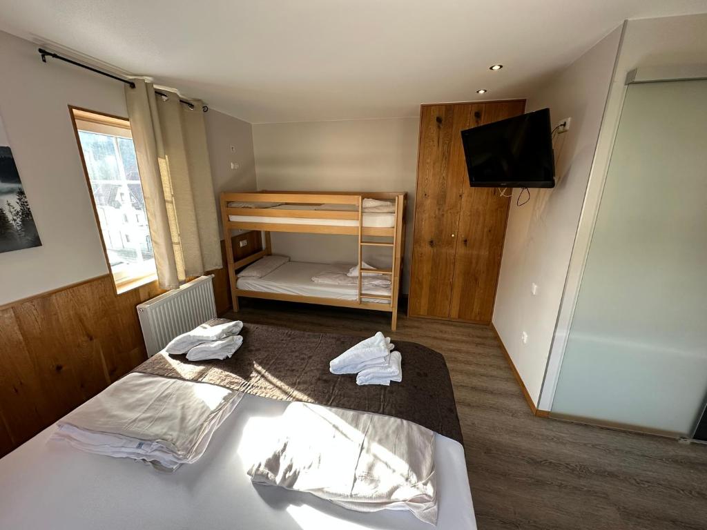 Postel nebo postele na pokoji v ubytování Hotel-Landgasthof Katschtalerhof