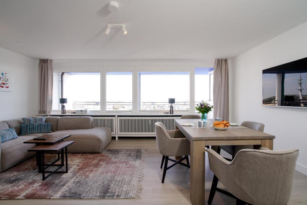 Ferienwohnung Sylter Welle mit kleinem Meerblick - Housity