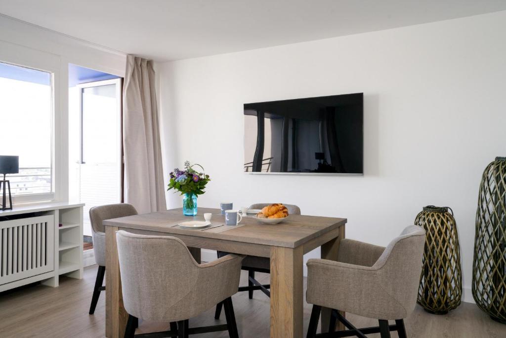 Ferienwohnung Sylter Welle mit kleinem Meerblick - Apartamento Con Balcón