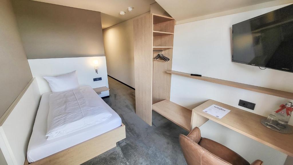 TV a/nebo společenská místnost v ubytování Hotel Berghof