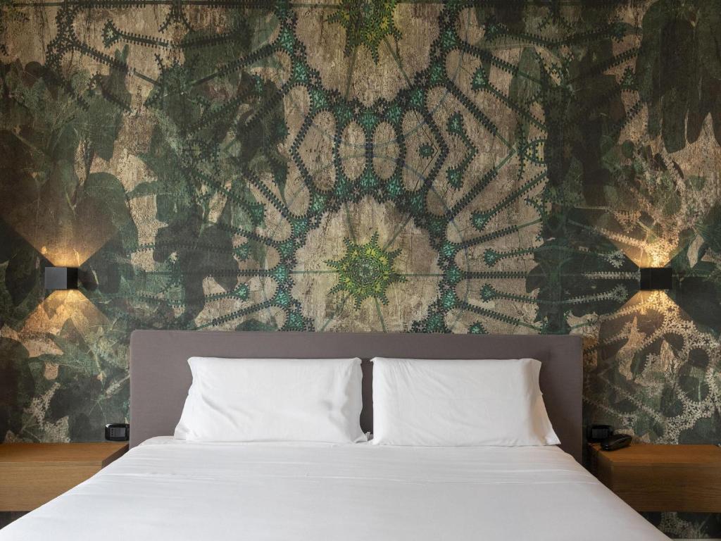 Posteľ alebo postele v izbe v ubytovaní B&B HOTEL Trapani Crystal