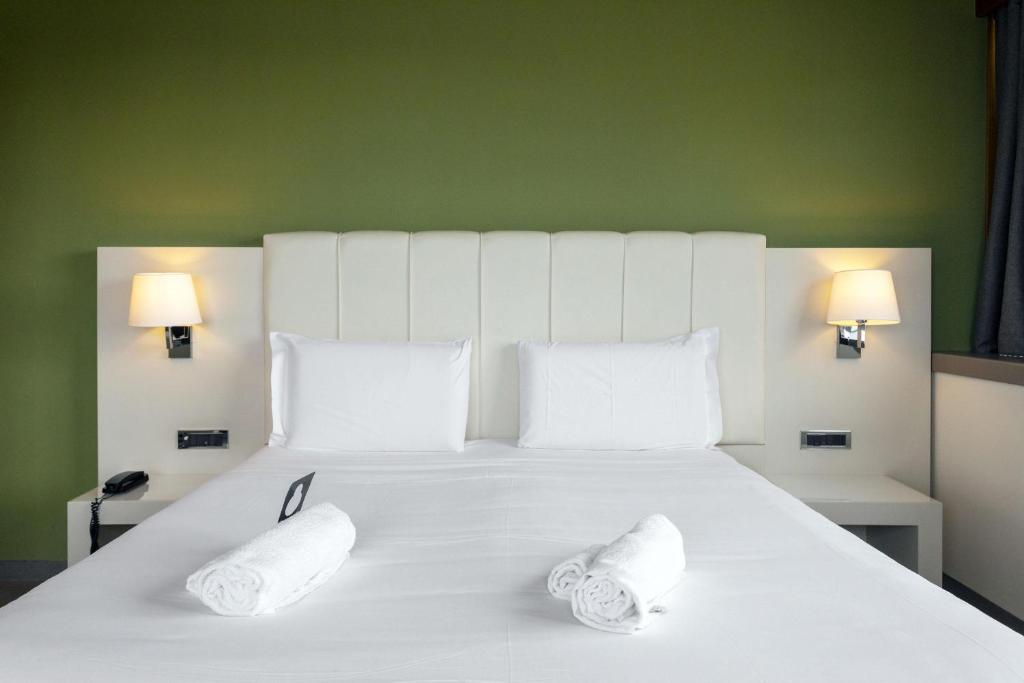 Posteľ alebo postele v izbe v ubytovaní B&B HOTEL Trapani Crystal