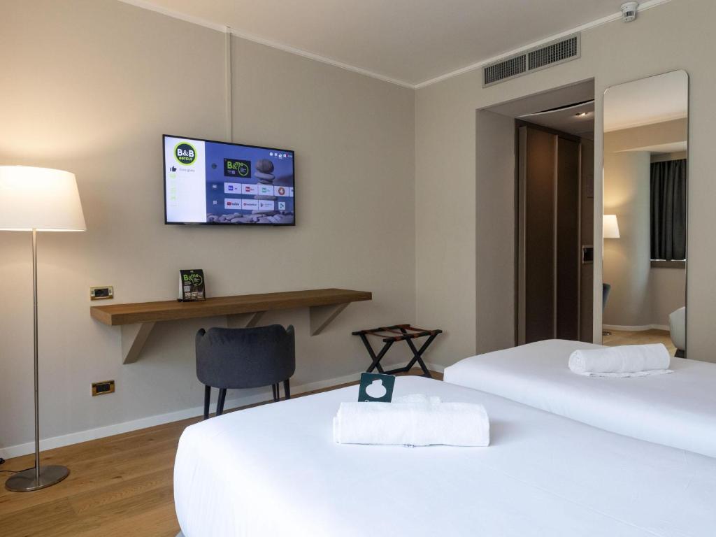 Posteľ alebo postele v izbe v ubytovaní B&B HOTEL Trapani Crystal