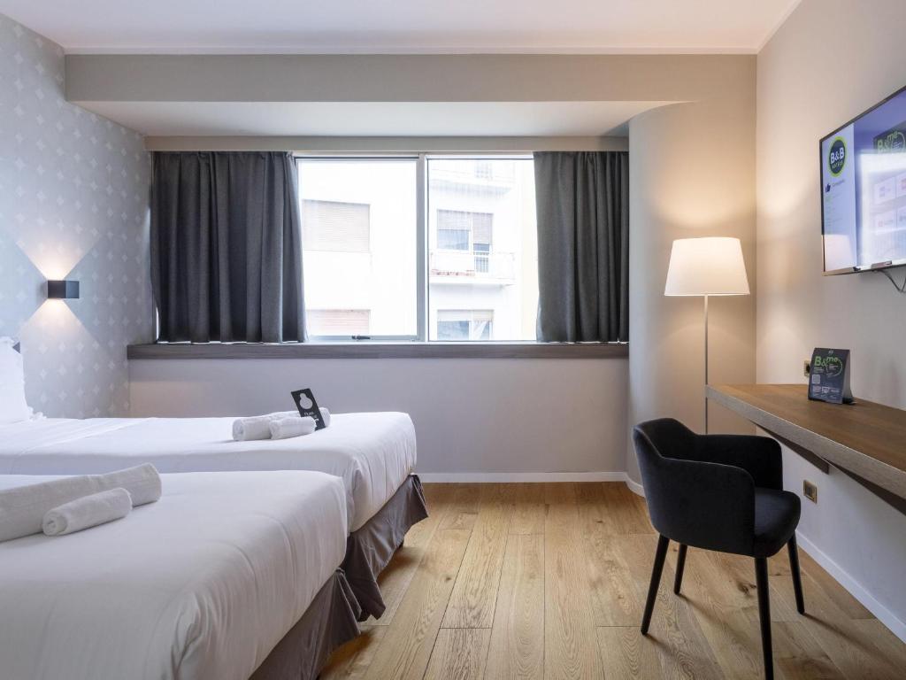Posteľ alebo postele v izbe v ubytovaní B&B HOTEL Trapani Crystal