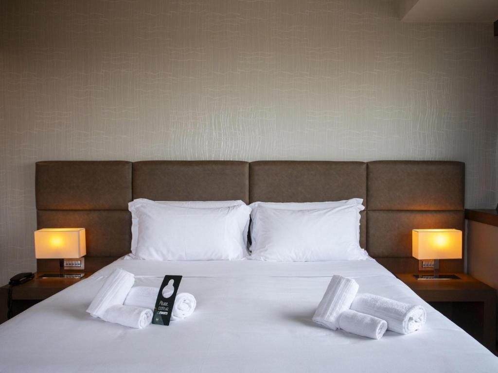 Posteľ alebo postele v izbe v ubytovaní B&B HOTEL Trapani Crystal
