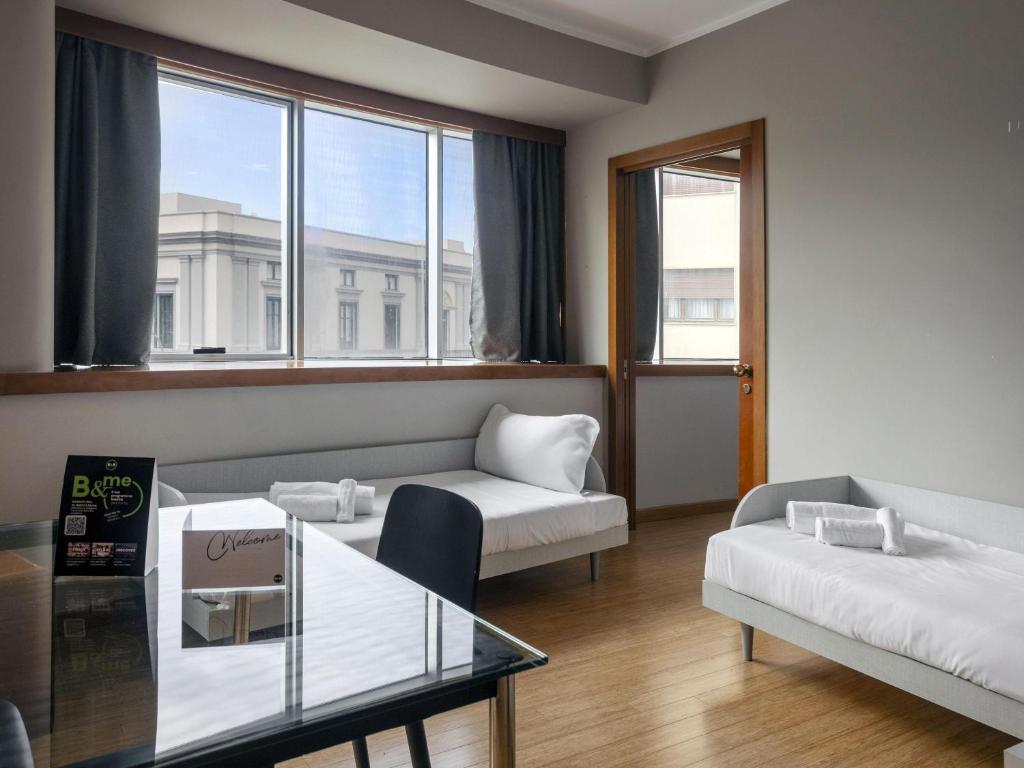 Posteľ alebo postele v izbe v ubytovaní B&B HOTEL Trapani Crystal