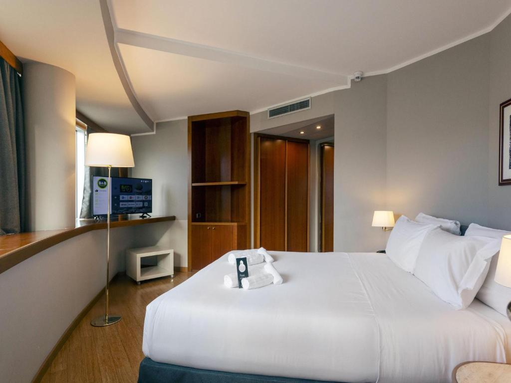 Posteľ alebo postele v izbe v ubytovaní B&B HOTEL Trapani Crystal
