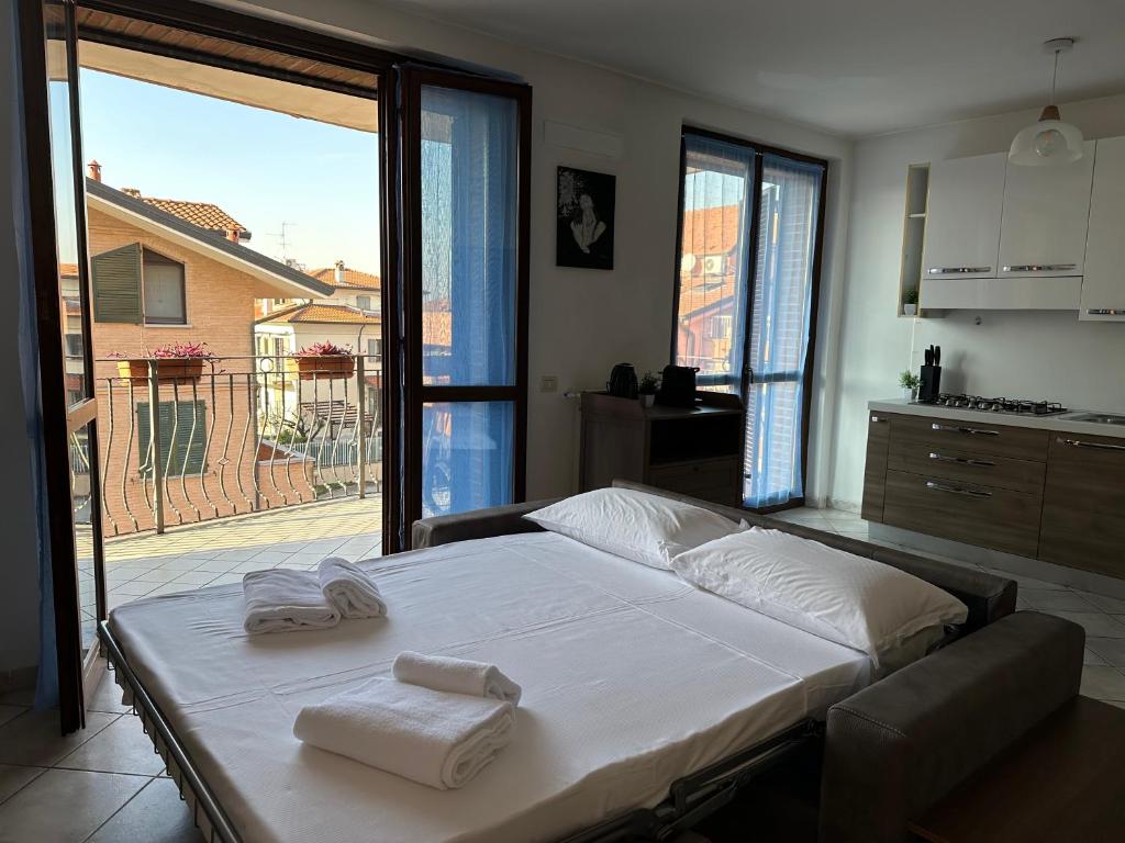 Postel nebo postele na pokoji v ubytování DeHomes - Relax & Business Apartments