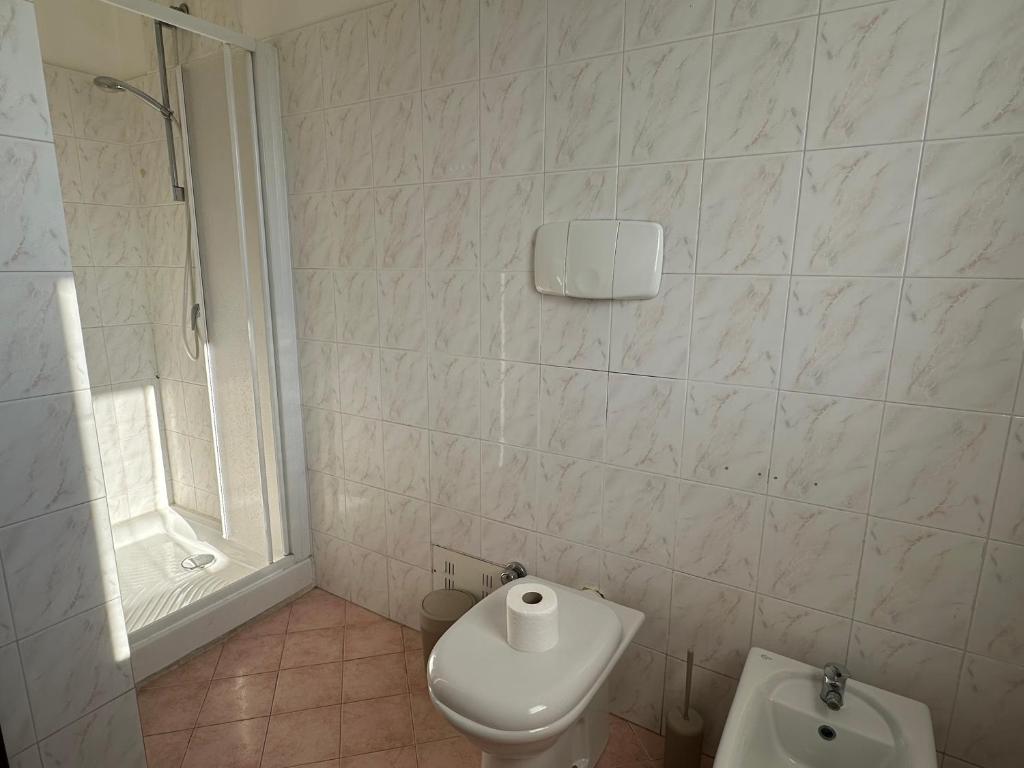 Koupelna v ubytování DeHomes - Relax & Business Apartments