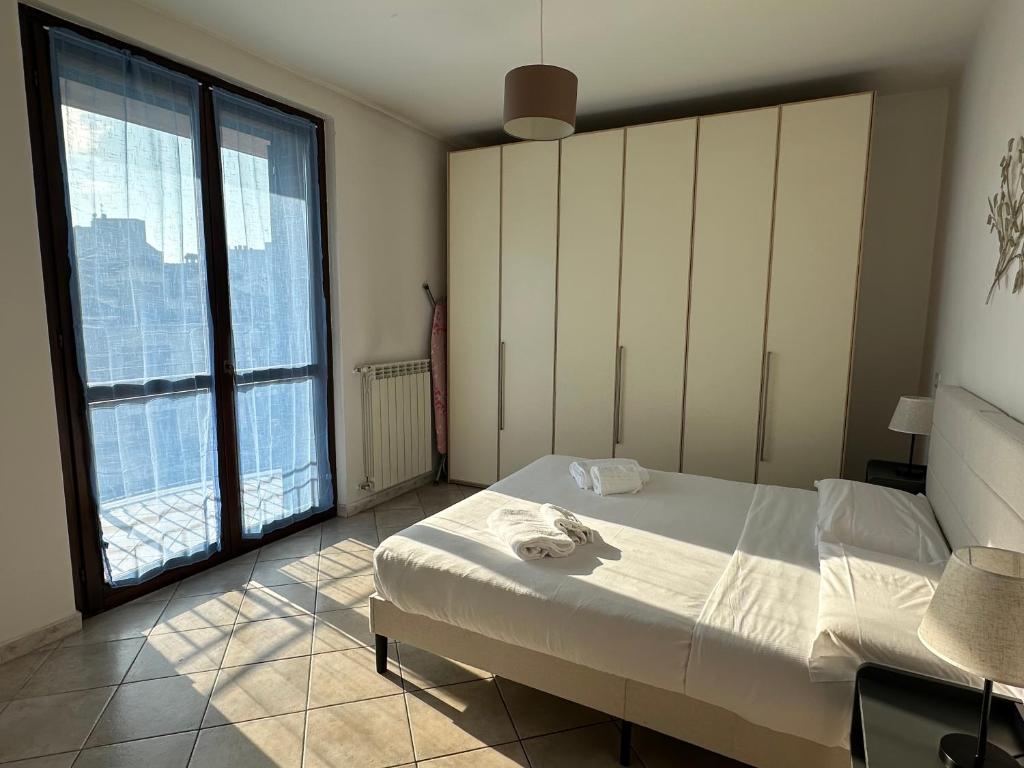 Postel nebo postele na pokoji v ubytování DeHomes - Relax & Business Apartments