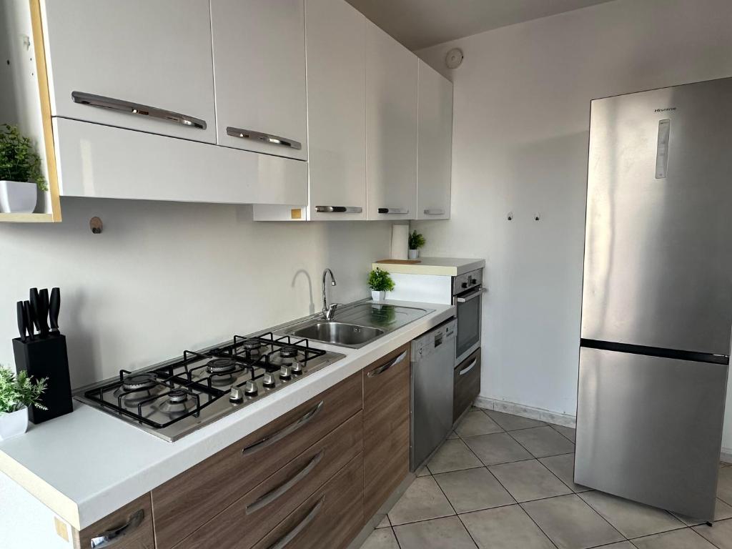 Kuchyň nebo kuchyňský kout v ubytování DeHomes - Relax & Business Apartments