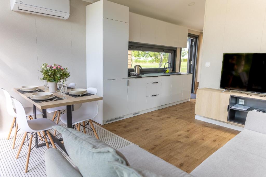 Beztroska Zatoka - ośrodek wypoczynkowy Jacuzzi & Sauna - Chalet Met 2 Slaapkamers