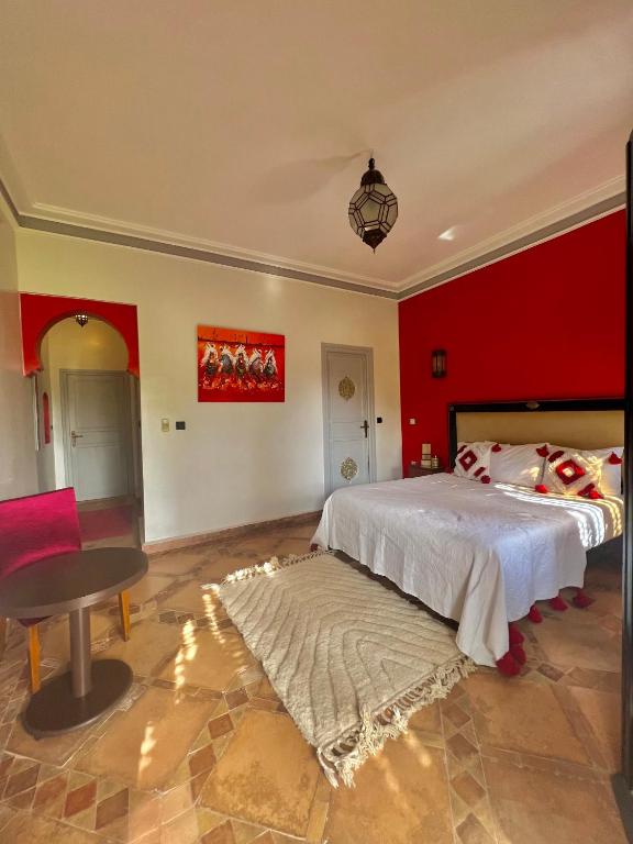 Postel nebo postele na pokoji v ubytování Le Rubis Oriental Marrakech