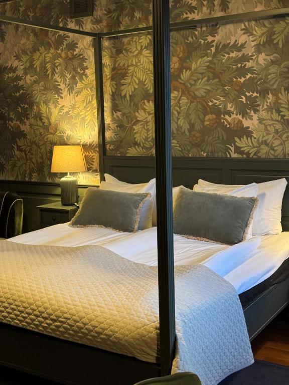 Postel nebo postele na pokoji v ubytování Hotel Jämteborg