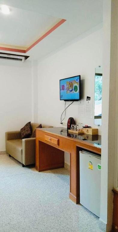 TV a/nebo společenská místnost v ubytování The Grand Koh Chang Hotel