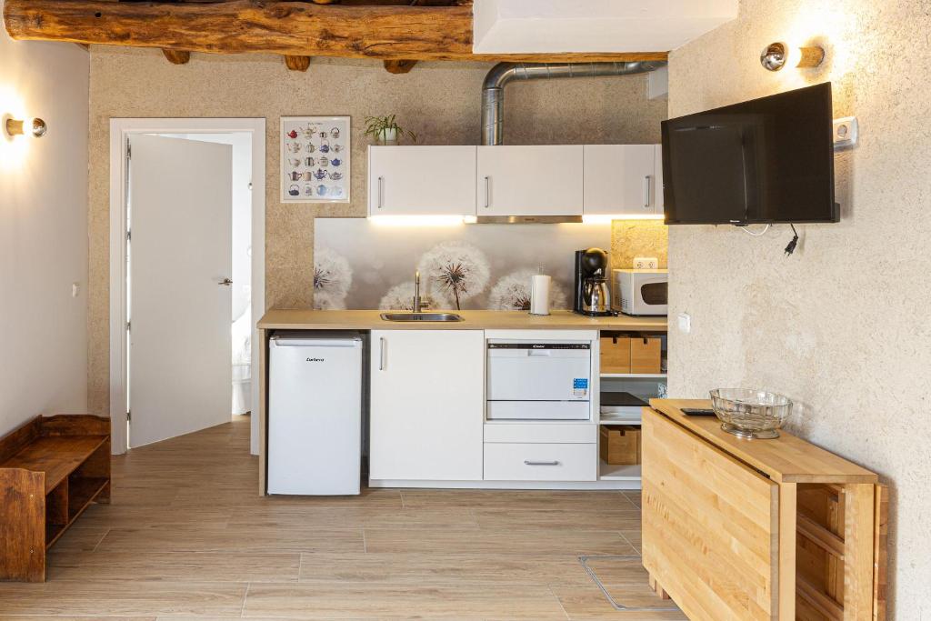 Kuchyň nebo kuchyňský kout v ubytování Mokorroko Borda Hostal Rural