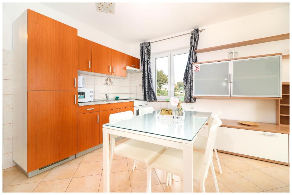 Kuchyň nebo kuchyňský kout v ubytování M&Z Apartmani