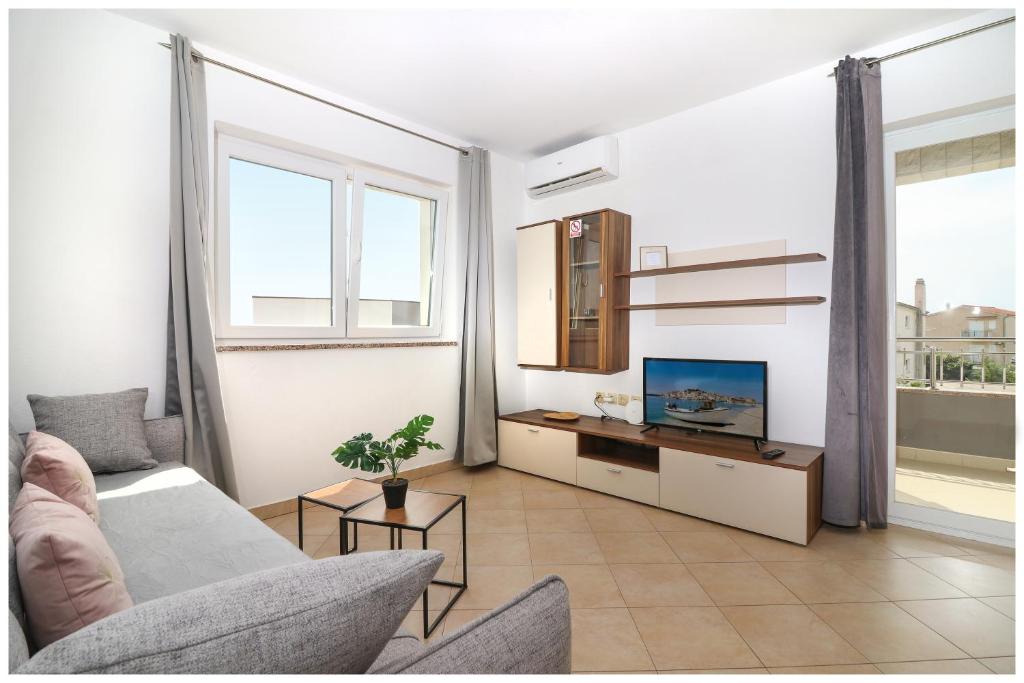TV a/nebo společenská místnost v ubytování M&Z Apartmani