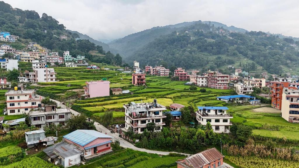 a group of houses in a village in a mountain at Niru Yoga Homestay sound healing & hiking retreat in Bhaktapur